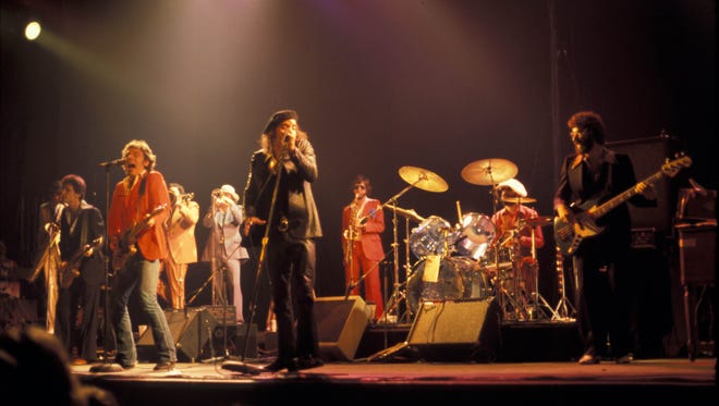 Bruce Springsteen (l, in red), and Miami (now Little Stevie) Van Zandt take over for Southside Johnny and lead the Asbury Jukes at Monmouth Arts Center (now the Count Basie Theatre) in Red Bank in May 1977.