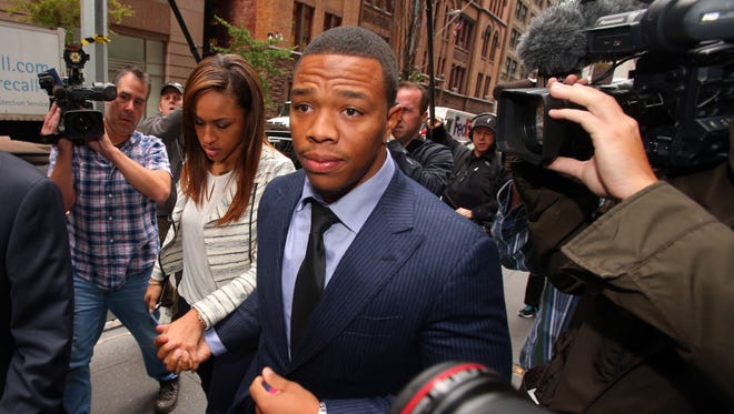 FILE -- Ray Rice arrives with his wife, Janay Rice for his appeal hearing on his indefinite suspension from the NFL, Nov. 5, 2014.