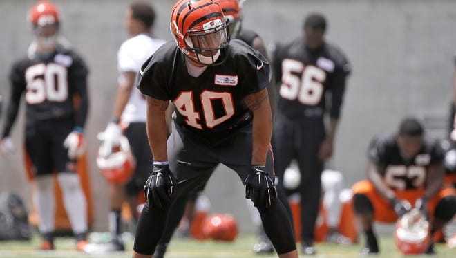 Bengals free safety Derron Smith prepares for kickoff drills during minicamp practice Thursday at Paul Brown Stadium.