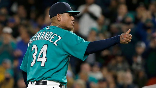 Seattle Mariners starting pitcher Felix Hernandez gives a thumbs-up as he is pulled from the team's baseball game against the Kansas City Royals in the eighth inning, Friday, April 29, 2016, in Seattle. The Mariners won 1-0. (AP Photo/Ted S. Warren)
