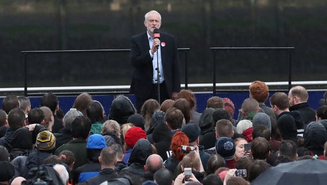 Britain's main opposition Labour Party leader Jeremy Corbyn, center, speaks at a general election campaign event in Gateshead, north east England, on June 5.