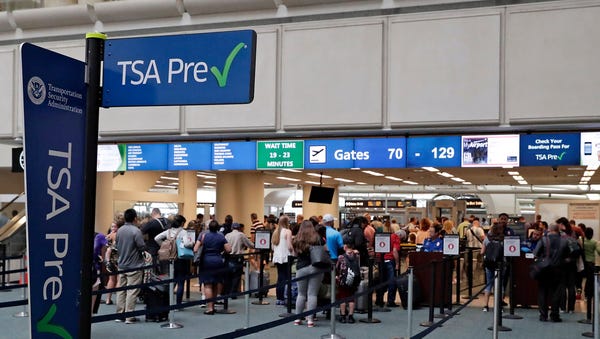 TSA precheck in Orlando, Florida, on June 21,...