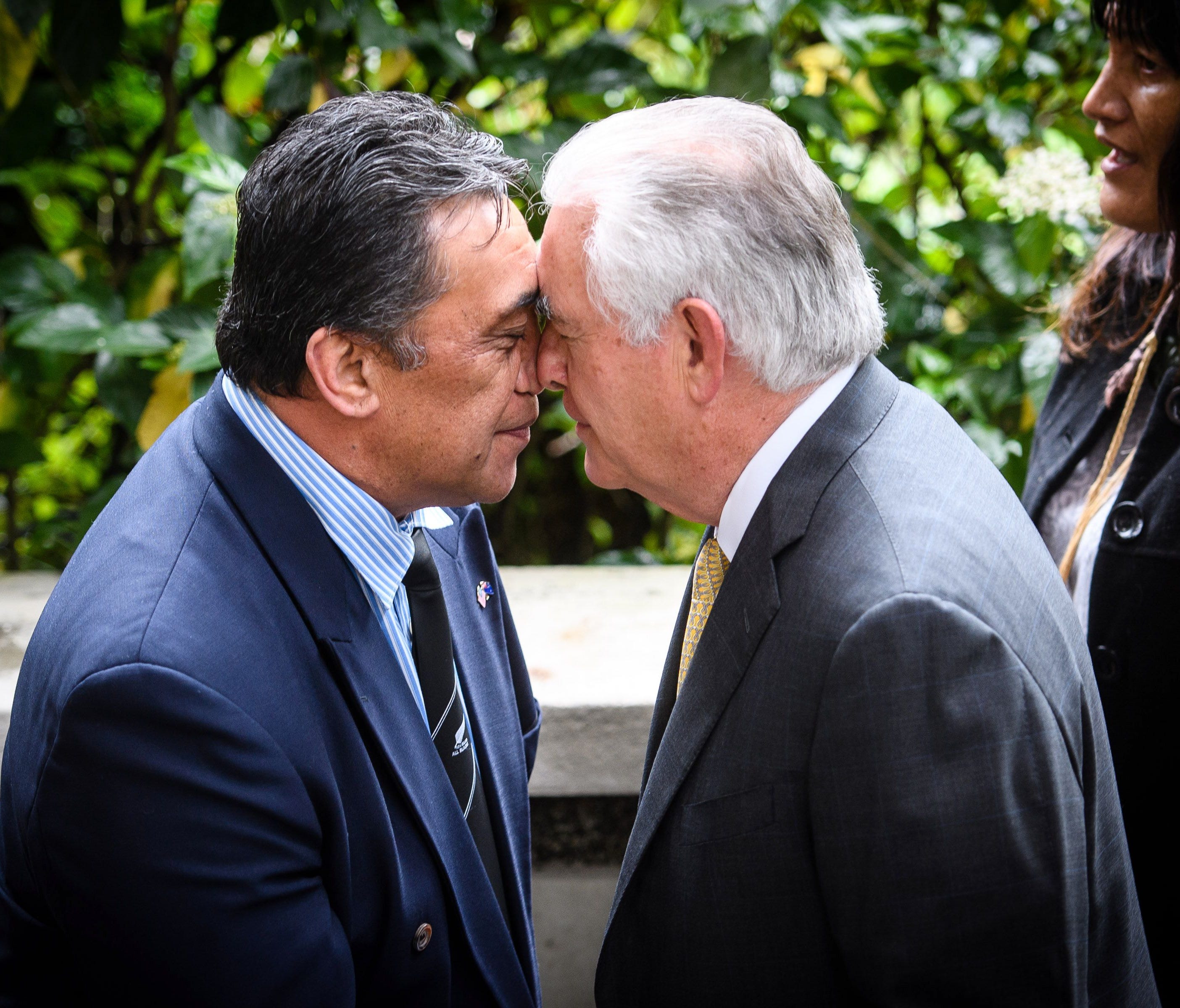 US Secretary of State Rex Tillerson receives a hongi, a traditional greeting, by a Maori elder as he is welcomed to Premiere House in Wellington on June 6, 2017.