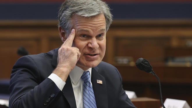 Federal Bureau of Investigation Director Christopher Wray testifies before a House Committee on Homeland Security hearing on 'worldwide threats to the homeland', Thursday, Sept. 17, 2020 on Capitol Hill Washington.