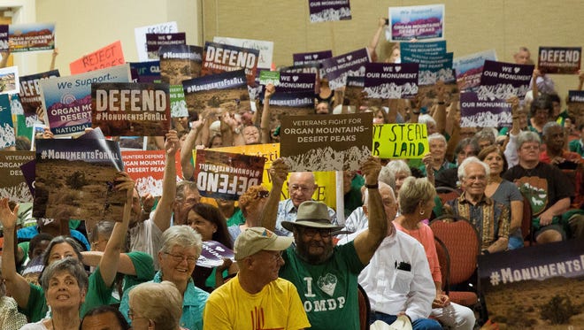 Supporters of the Organ Mountains-Desert Peaks National Monument, cheer during a town hall organized by the City of Las Cruces as well as other groups, Thursday July 27, 2017, at the Las Cruces Convention Center.