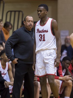 Doug Mitchell (left) will lean on IndyStar Mr. Basketball candidate Kris Wilkes as North Central looks to contend for a state title.