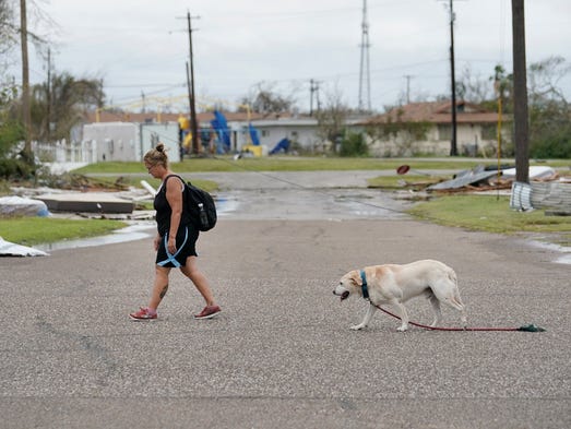 Local resident Valerie Cross, and her dog Boudreaux,
