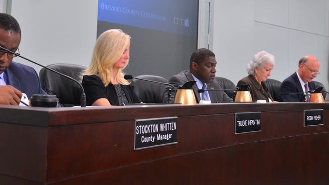 Updated August 2014 county commission photo of  Brevard coounty commissioners: county manager Stockton Whitten, Trudie Infantini, Robin Fisher, Mary Bolin Lewis, Chuck Nelson and Andy Anderson.