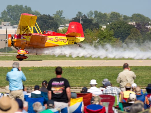 Balancing on one wheel, a souped adult Agcat wows the