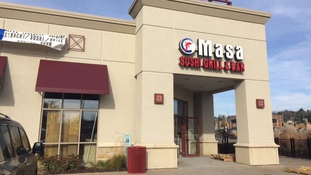 Police say a waiter was injured with a kitchen knife following an argument between the waiter and another employee at Masa Sushi Grill & Bar Friday.