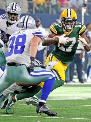 Green Bay Packers wide receiver Davante Adams (17) runs for yards after a catch against the Dallas Cowboys Sunday, October 8, 2017 at AT&T Stadium in Arlington, Tx.