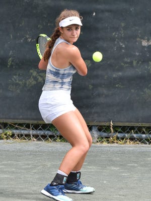 Rosie Garcia returns a serve during the USTA Southern 16s at Pierremont Oaks Tennis  Club.