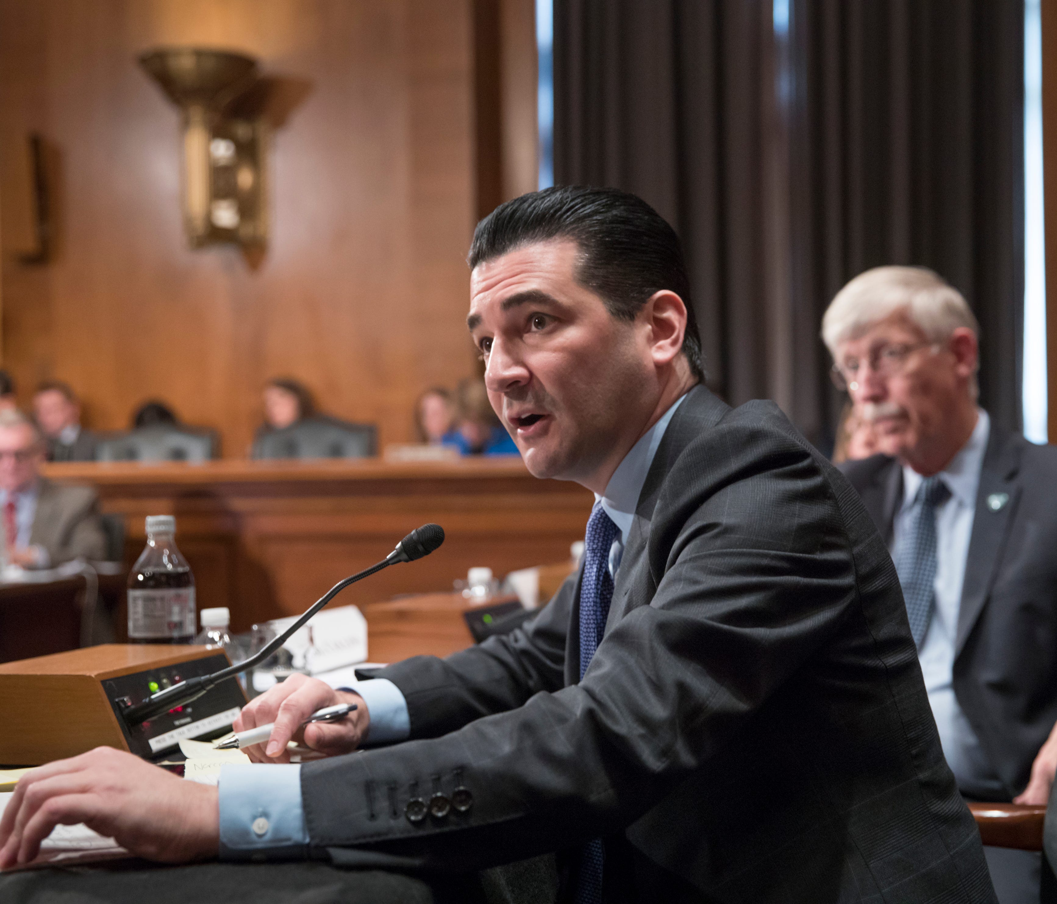 Scott Gottlieb, commissioner of the Food and Drug Administration, answers a question as the Senate Health, Education, Labor and Pensions Committee examines the federal response to the opioid addiction crisis on Oct. 5, 2017.