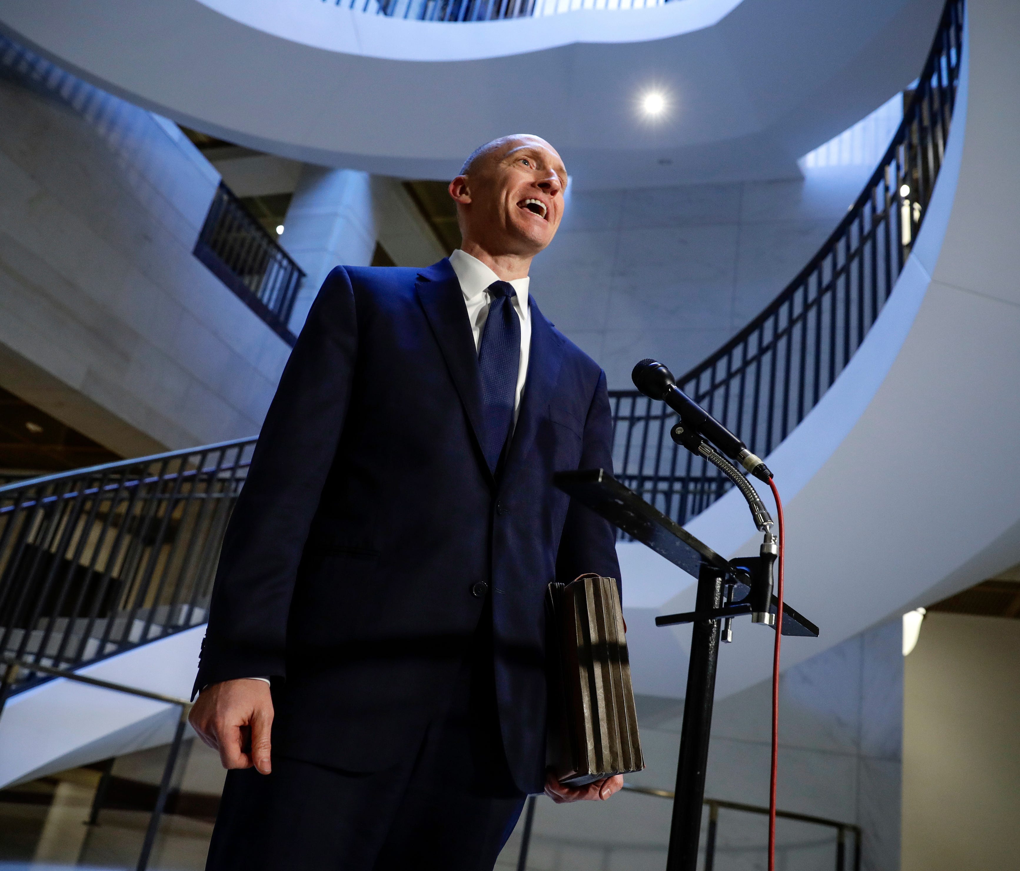 Carter Page, a foreign policy adviser to Donald Trump's 2016 presidential campaign, speaks with reporters following a day of questions from the House Intelligence Committee, on Capitol Hill in Washington, Thursday, Nov. 2, 2017.