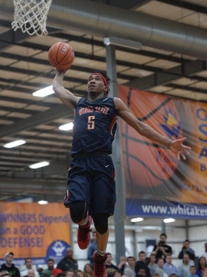 Malik Monk goes up for a dunk in the Nike Elite Youth Basketball League at Kentucky Basketball Academy in Lexington,Ky., on Saturday April 25, 2015.