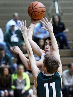Fowlerville's Josh DuFore scored 25 points and grabbed seven rebounds against Charlotte.