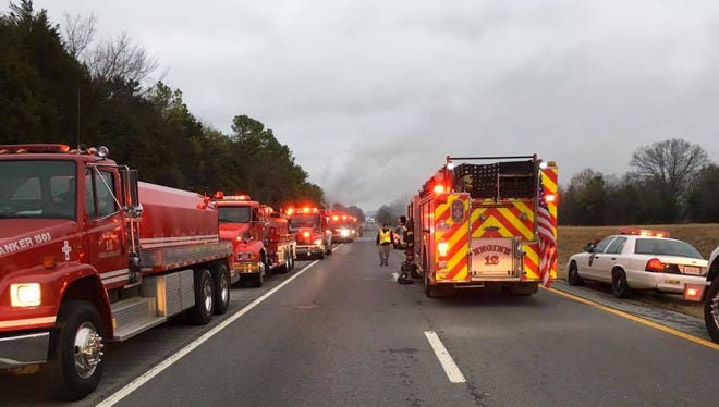 Emergency crews on scene of a semi fire involving hazardous materials that has shut down I-24 in Rutherford County Wednesday, Dec. 14, 2016