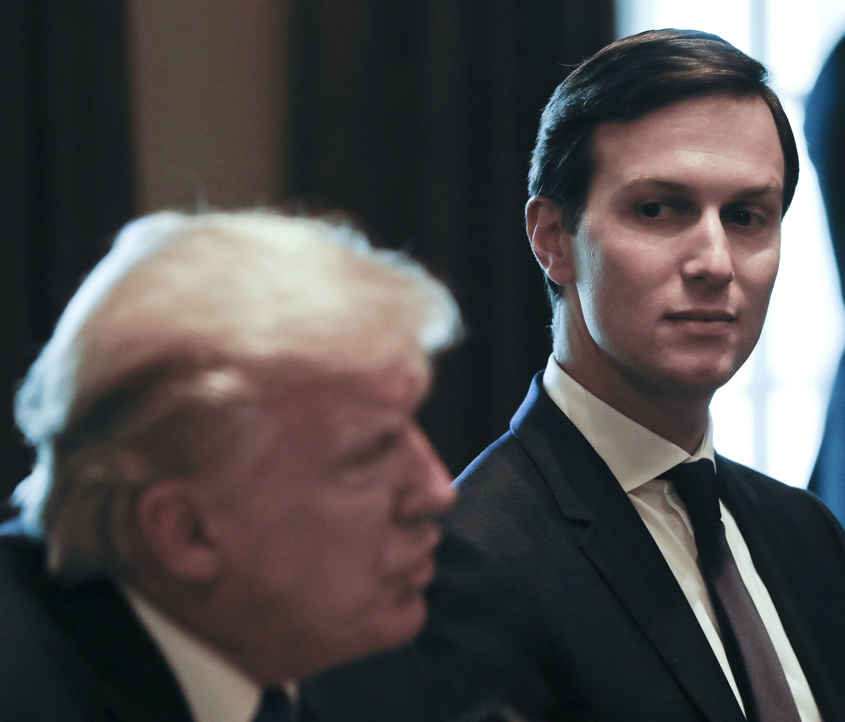 In this July 25, 2017, file photo, Jared Kushner listens at right as President Trump speaks during a meeting in the Cabinet Room of the White House.
