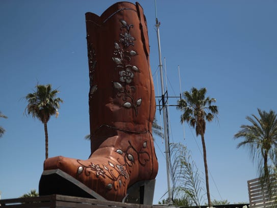 Boot art sits at the 2018 Stagecoach music festival.