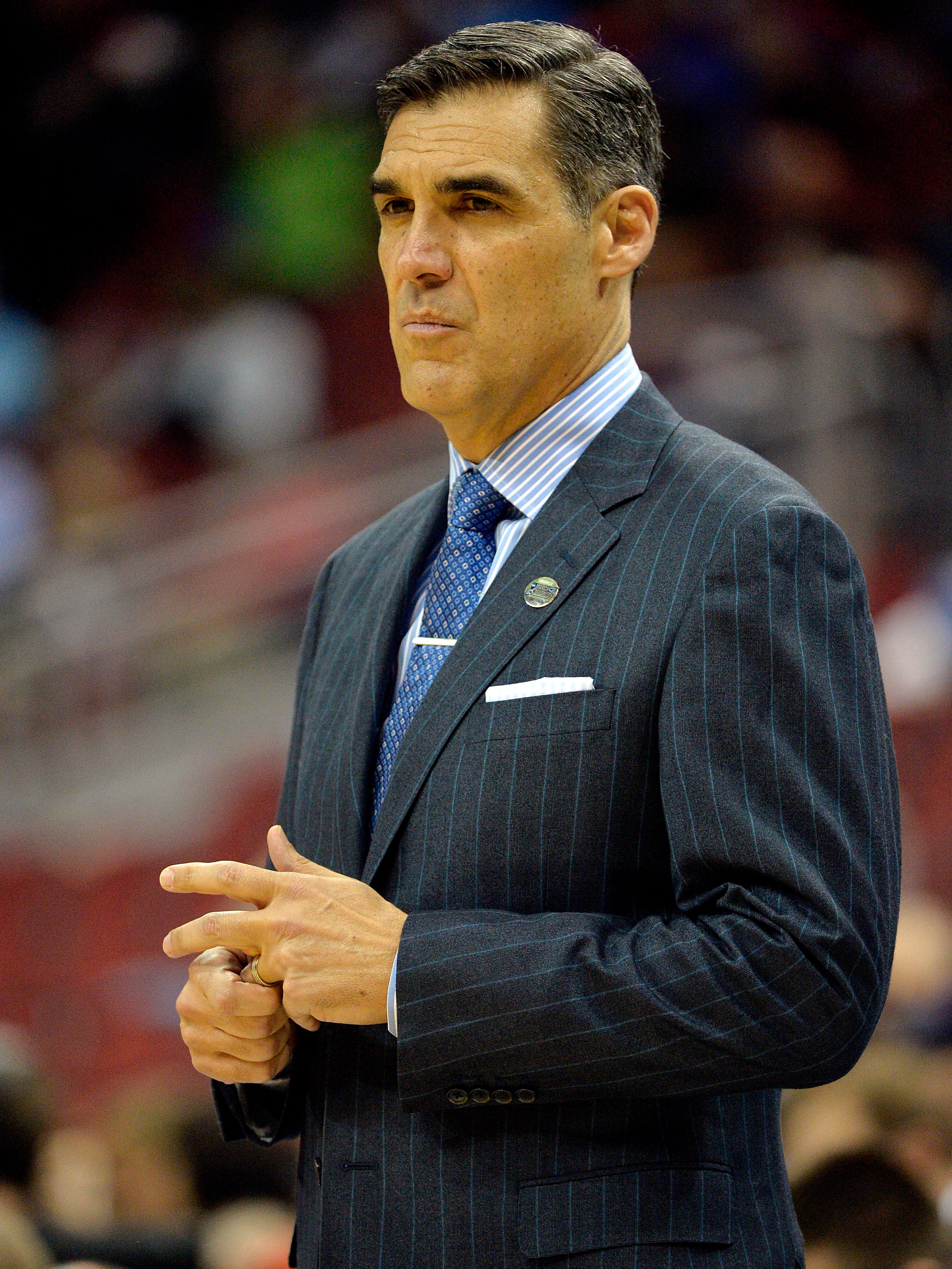 GQ Jay' Wright's suit game is strong; his players, coaches try to keep pace