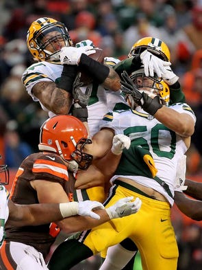 Green Bay Packers strong safety Josh Jones (27) leaps