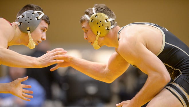 McCutcheon graduate Alex Griffin, right, will be among 18 Purdue wrestlers competing this weekend in the University Nationals at Akron, Ohio.