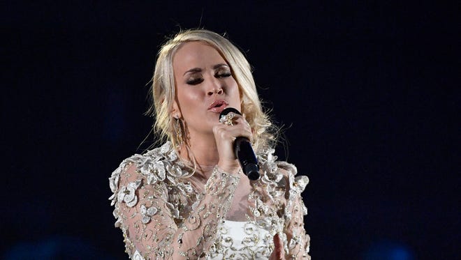 Super Bowl song 'The Champion' features vocals by country singer Carrie Underwood and hip hop artist Ludacris.