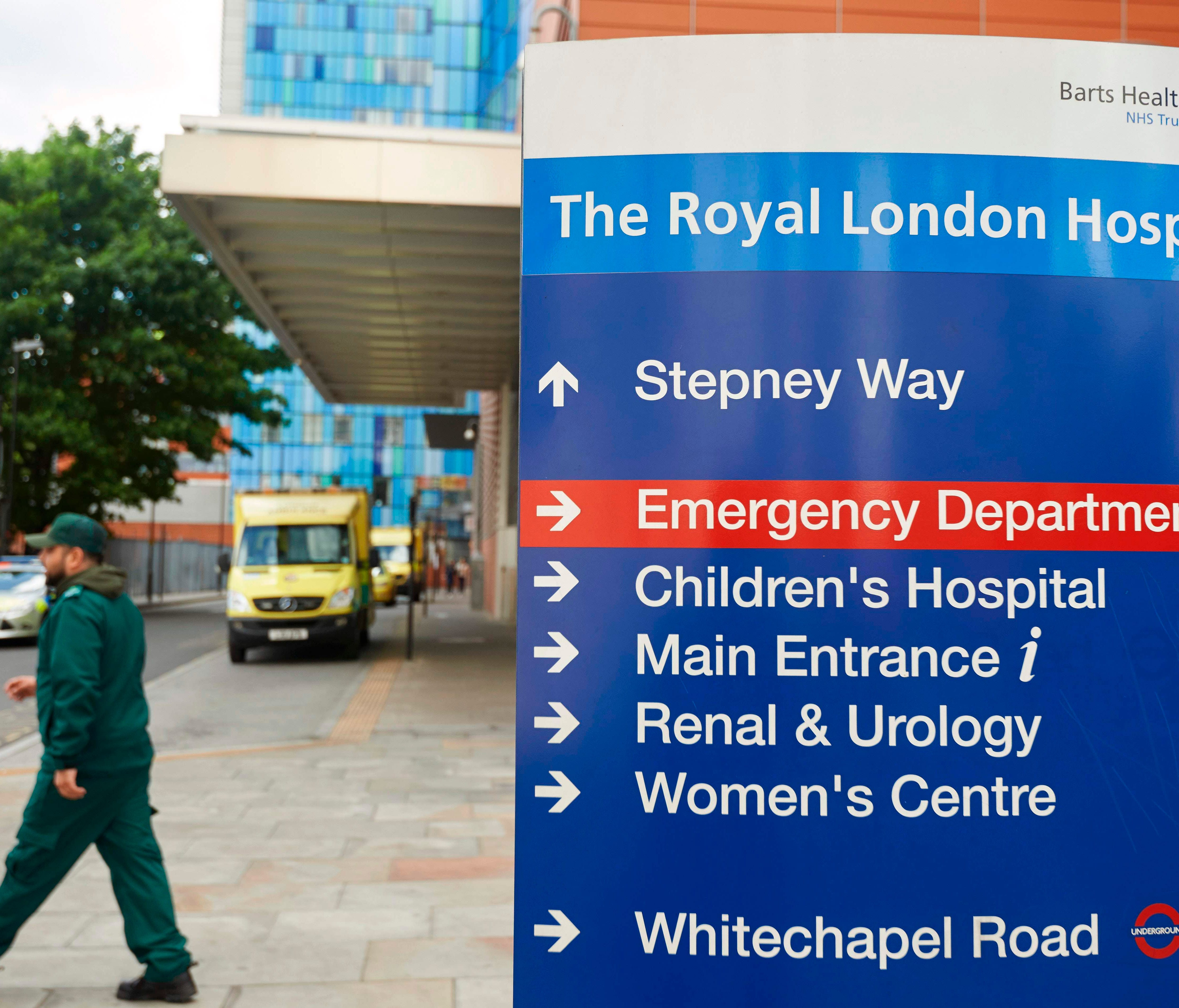 Signage is seen outside The Royal London Hospital in London on May 14, 2017, which was among places hit by a global cyberattack.