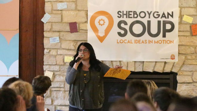 Amanda Salazar opens the evening at Sheboygan SOUP Thursday April 27, 2017 at Kiwanis Park in Sheboygan, Wis. The community-based crowdfunding dinner — its name stands for Support Our Urban Projects — supports local projects and is modeled after the successful Detroit SOUP.