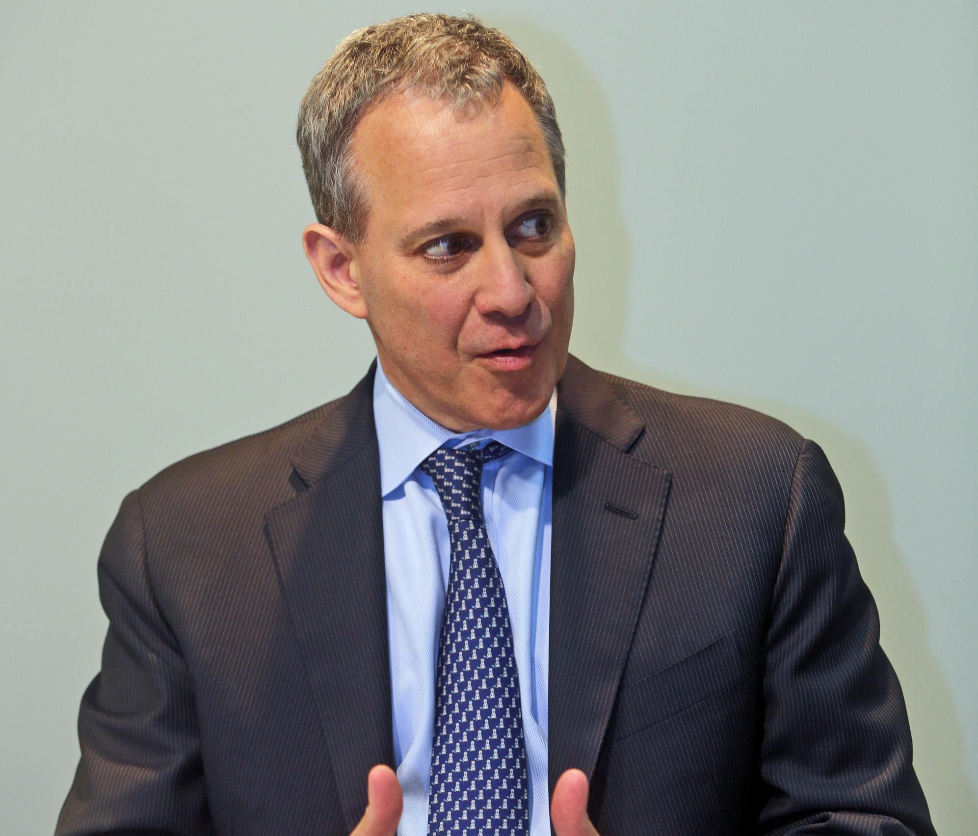 New York State Attorney General Eric Schneiderman speaking with reporters and members of The Journal News editorial board Aug. 20, 2014.