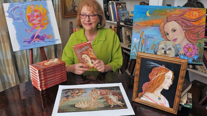 Brevard author and poet Fay Picardi with her book “Simonetta,” based on the model for Botticelli’s painting “Birth of Venus.” The book cover is designed by Kathy Garvey. The various interpretive paintings around the table are by fellow members of “Pieces of 8,” a Brevard art group.
