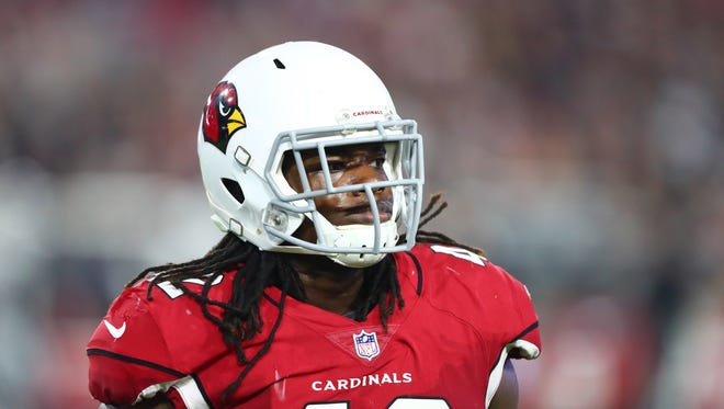 Cardinals defensive end Cap Capi looks on during a game against the Oakland Raiders on Aug. 12, 2017.