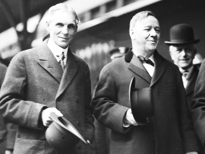Henry Ford, left, is photographed at the Michigan Central