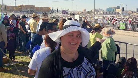 Father James B. Hay Catholic School Principal Julia Fracker stands outside the pope's Mass site in Juarez on Wednesday.