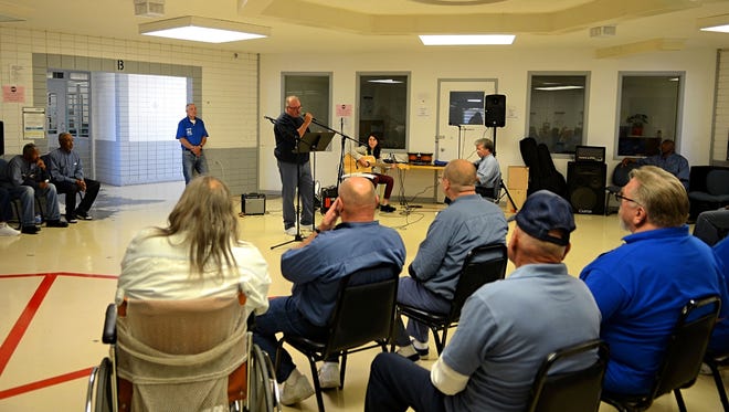 Inmates participating in a songwriting workshop perform on June 8, 2018 at the Northern Nevada Correctional Center in Carson City.