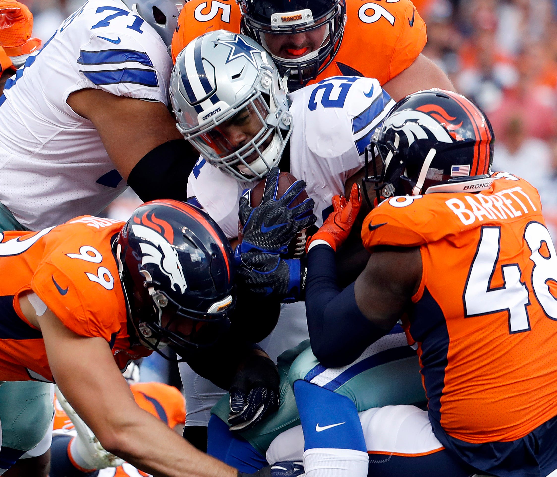 Cowboys running back Ezekiel Elliott was stuffed by the Broncos on Sunday.