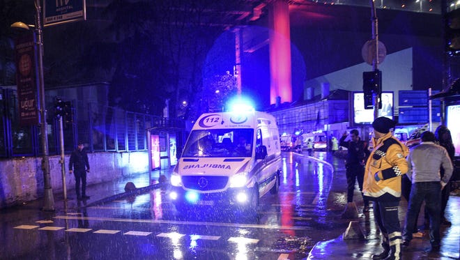 Ambulances rushing away from the scene of an attack in Istanbul, early Sunday, Jan. 1, 2017. Private NTV television said more than one assailant may have been involved in the attack. The attacker or attackers are believed to have entered the nightclub in Istanbul's Ortakoy district disguised as Santa Claus, the station reported. (AP Photo)