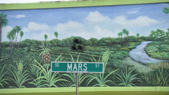 A pineapple mural is seen on the Posh Pineapple on 11760 S.E. Dixie Highway in Hobe Sound. Murals are one of the jewels of Hobe Sound's atmosphere.