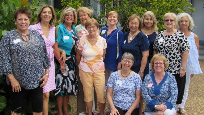Garden Club of Stuart members, from left, standing, are Nancy Hess, Jackie Regante Castanzo, Lana Turner, Mary Antaya, Dolores Eaton, Cathy Stroud, Diana Welch, Georgeann Sgnossi, Joan Guilliano, and Susan Licari. Kneeling are, from left, Lynn Merritt and Leslie Perna.