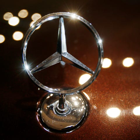 The iconic logo of luxury automaker Mercedes-Benz,