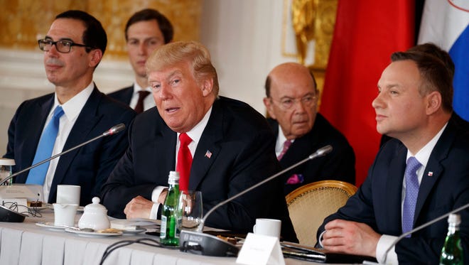 President Trump speaks during the Three Seas Initiative transatlantic roundtable in the Great Assembly Hall of the Royal Castle in Warsaw Thursday.