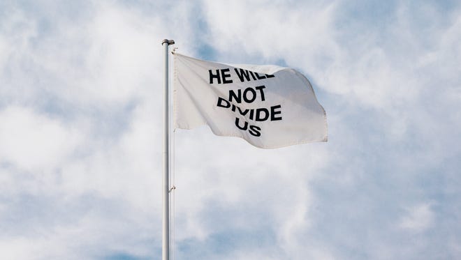 A "He Will Not Divide Us" flag shown flying in Greeneville, T.N. in March.