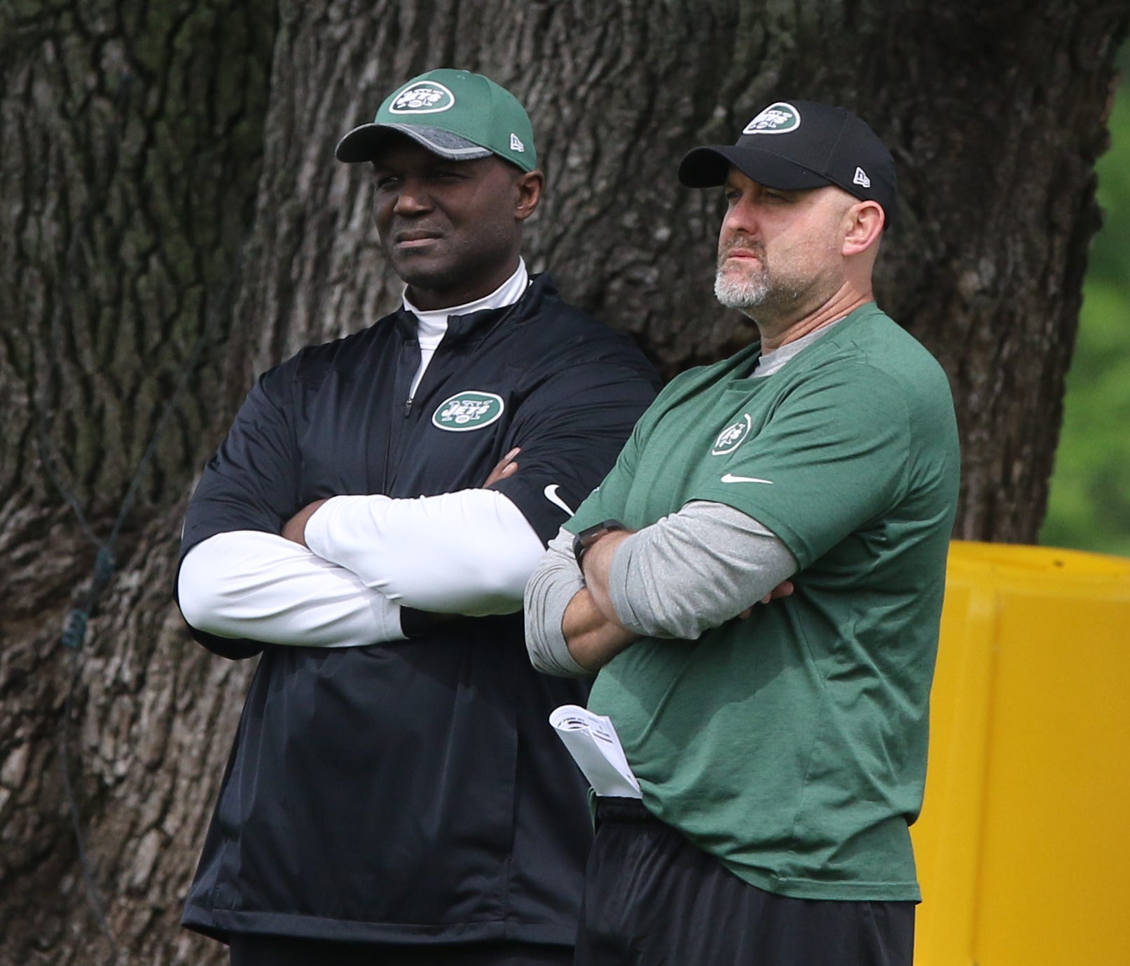 The Jets head coach Todd Bowles and offensive coordinator John Morton watch practice.