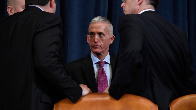 Rep. Trey Gowdy (R-SC), center, speaks with fellow members of the House Intelligence Committee during a hearing on alleged Russian interference in the 2016 election. Gowdy is being considered for FBI director.