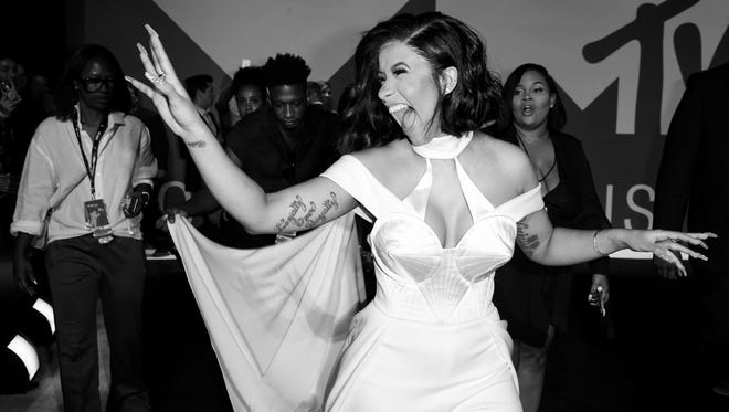 Cardi B celebrates at the 2017 MTV Video Music Awards.