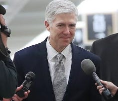 Judge Neil Gorsuch visits the Senate on Feb. 9, 2017.