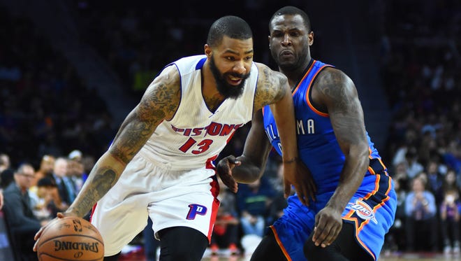 Pistons forward Marcus Morris (13) dribbles the ball as Thunder guard Dion Waiters (3) defends during the fourth quarter at The Palace of Auburn Hills Tuesday.