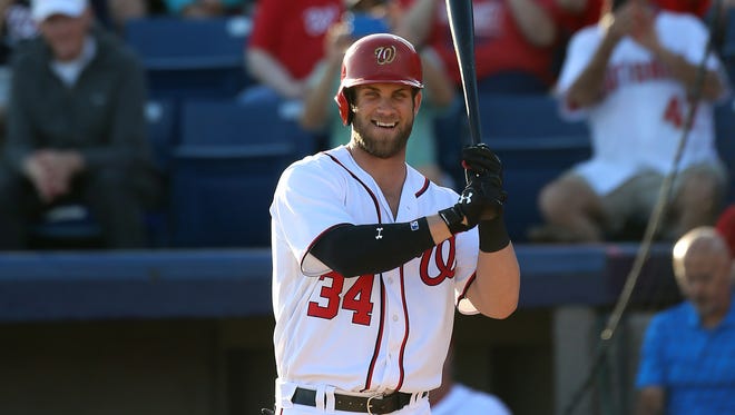 Washington Nationals right fielder Bryce Harper (34) smiles prior to an at-bat against the Houston Astros at Space Coast Stadium on March 10.