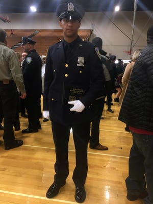 In this photo provided by The Port Authority of New York & New Jersey, Anthony Varvaro, who graduated from the Port Authority of New York and New Jersey police academy poses at a graduation ceremony in Elizabeth, N.J., Friday, Dec. 9, 2016. Varvaro was a relief pitcher for the Atlanta Braves, Seattle Mariners and Boston Red Sox from 2010 to 2015.