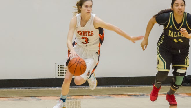 Ventura College freshman Katie Campbell looks up the floor in a game against Valley College earlier this season.